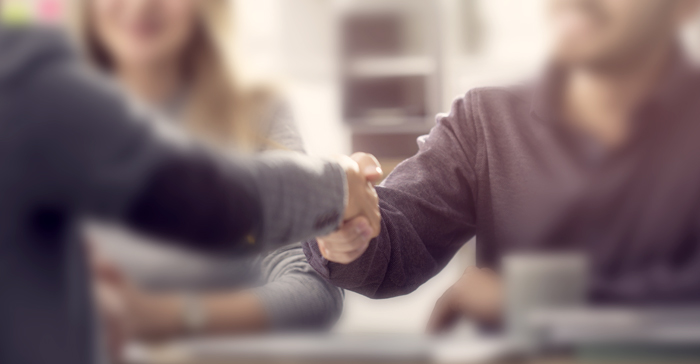 Restart Loans – a fair alternative relieved man shakes hands with advisor